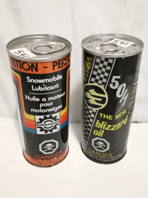 Bombardier and blizzard snowmobile tin cans, full