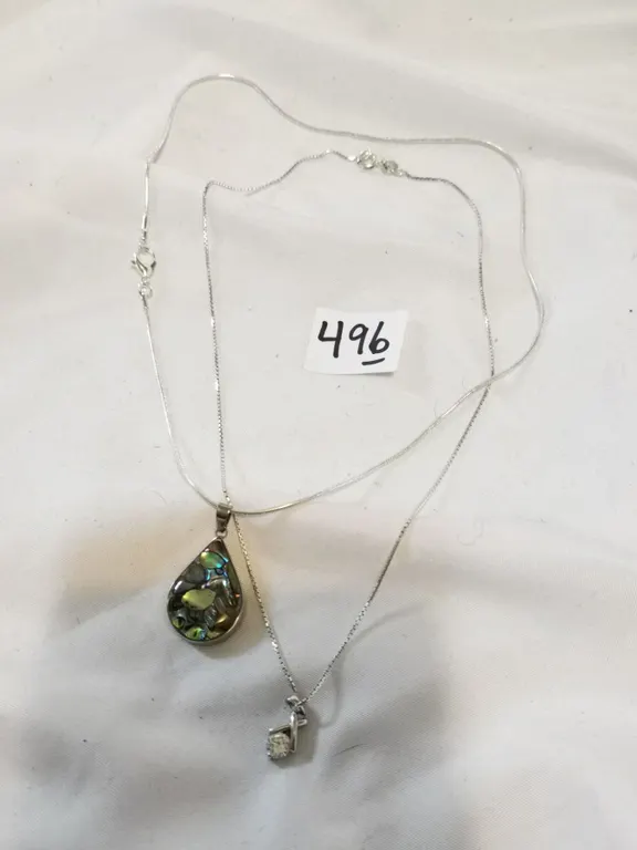 Two Necklaces with Pendants, one is Sterling