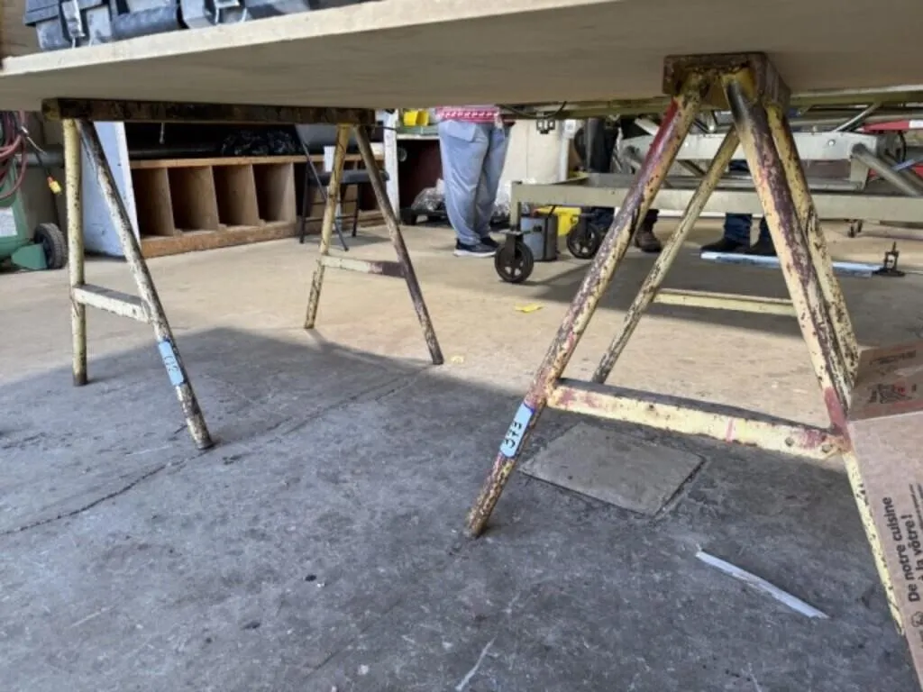 2 Metal Saw Horses c/w 4'x8' Fiber Board