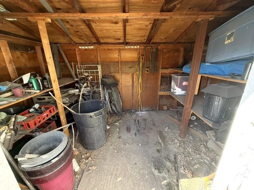 Contents of Garden Shed : Bug Zapper, Golf Clubs,