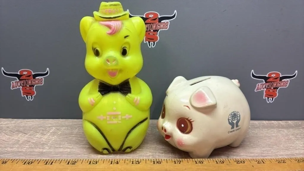 2 Plastic Piggy Banks.