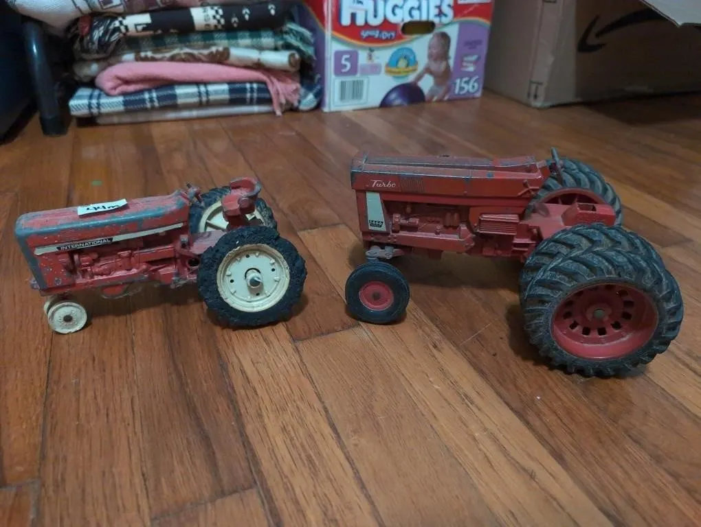 2 vintage metal tractors
