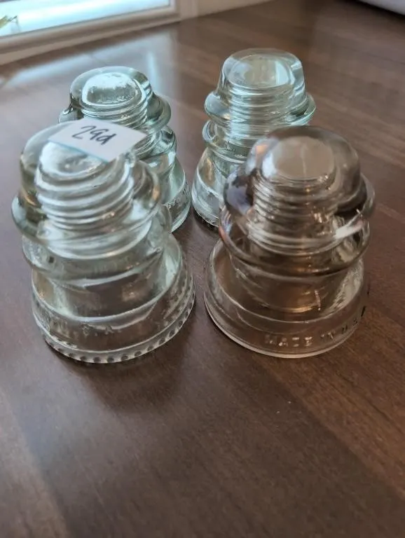 4 vintage glass insulators