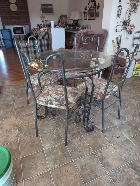 Glass and metal table, 4 chairs 40in