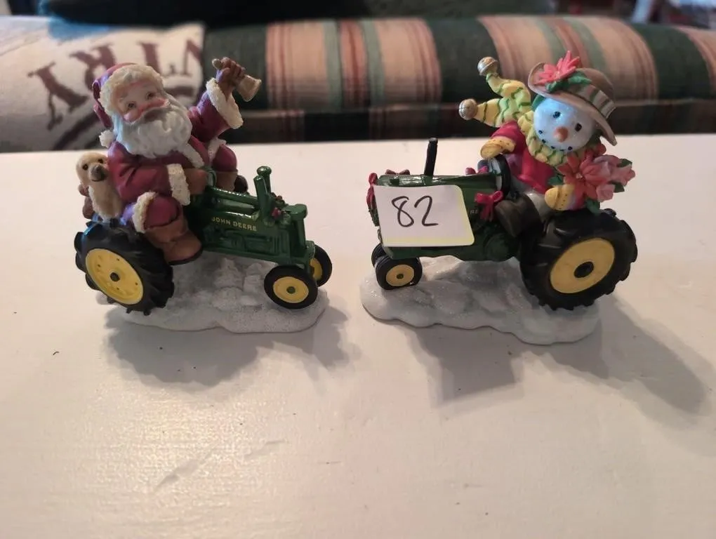 2 John Deere Christmas tractor figurines