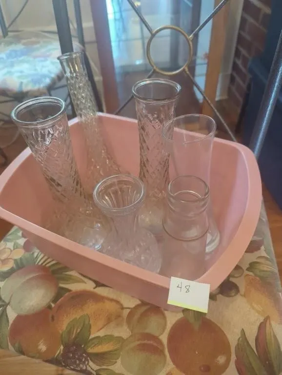 Assorted glass vases and plastic pail