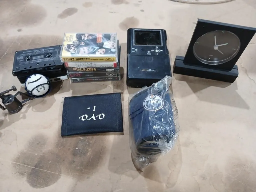 Box with Clock, Spypoint trail camera, Oilers