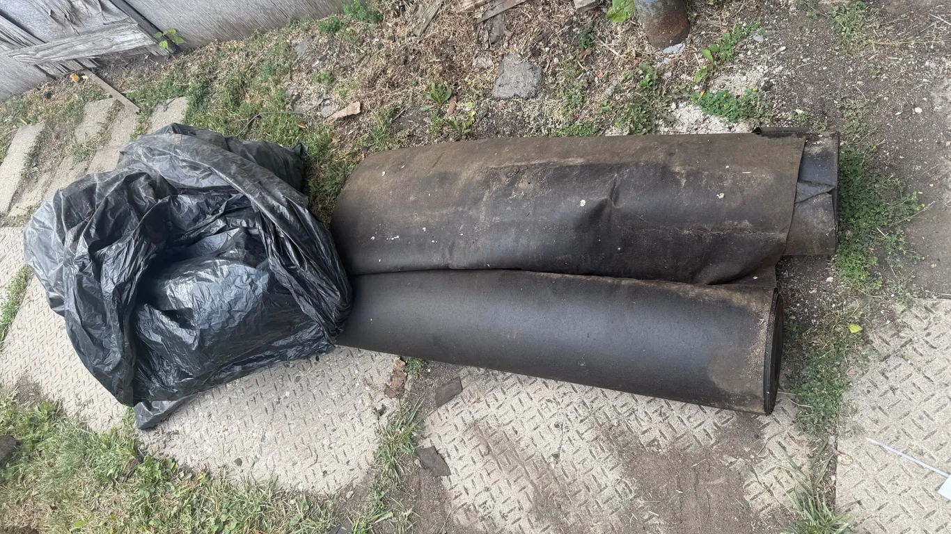 (2) Rolls of Roofing Tar Paper and Bag of Tarps (Unknown Sizes)