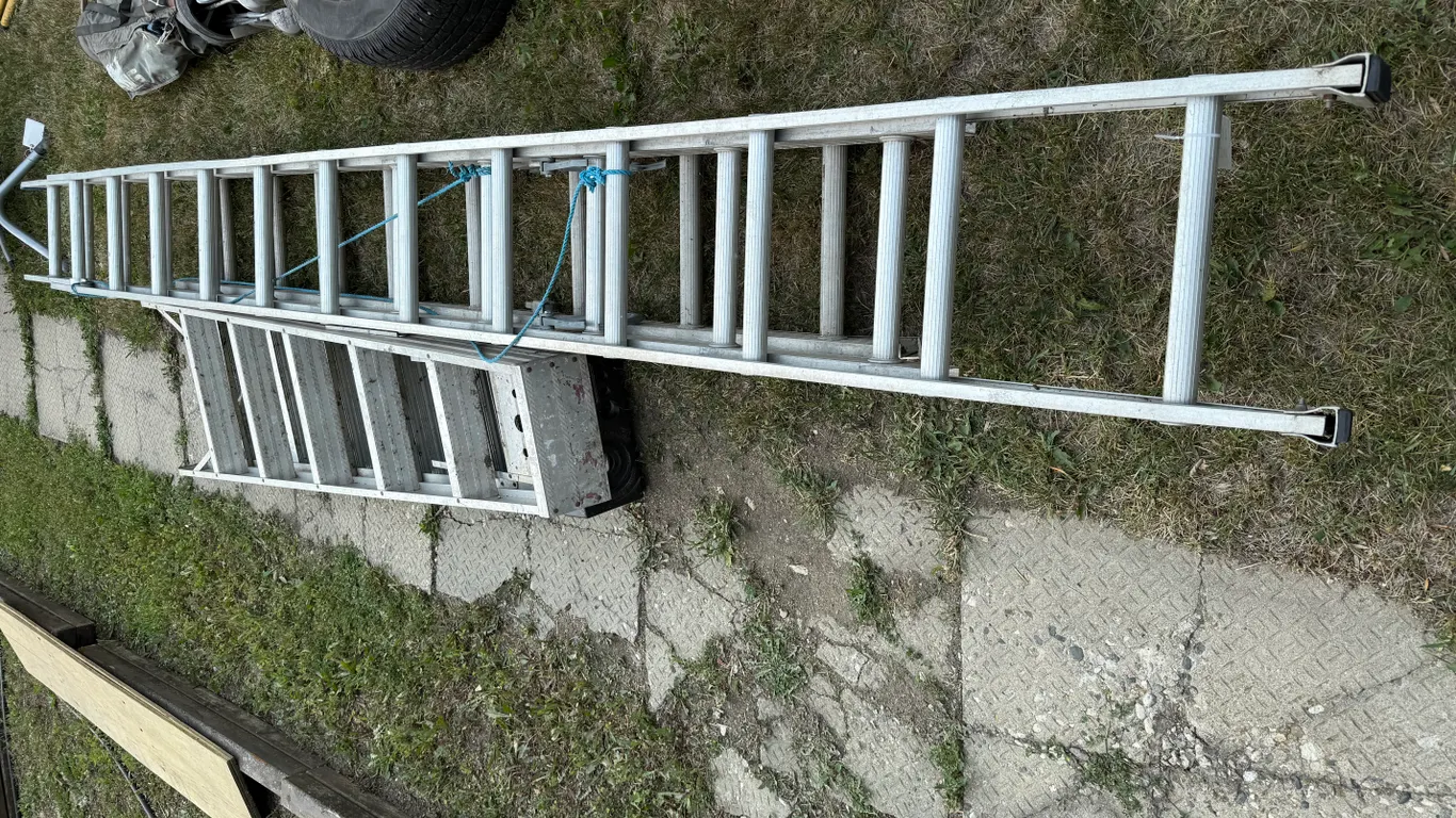 (2) Step Ladders and (2) Extension Ladders