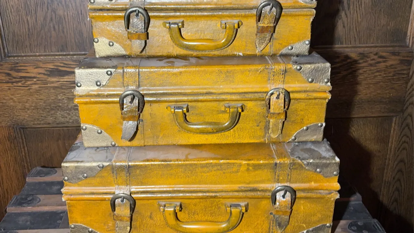 Three Graduated Decorative Trunks