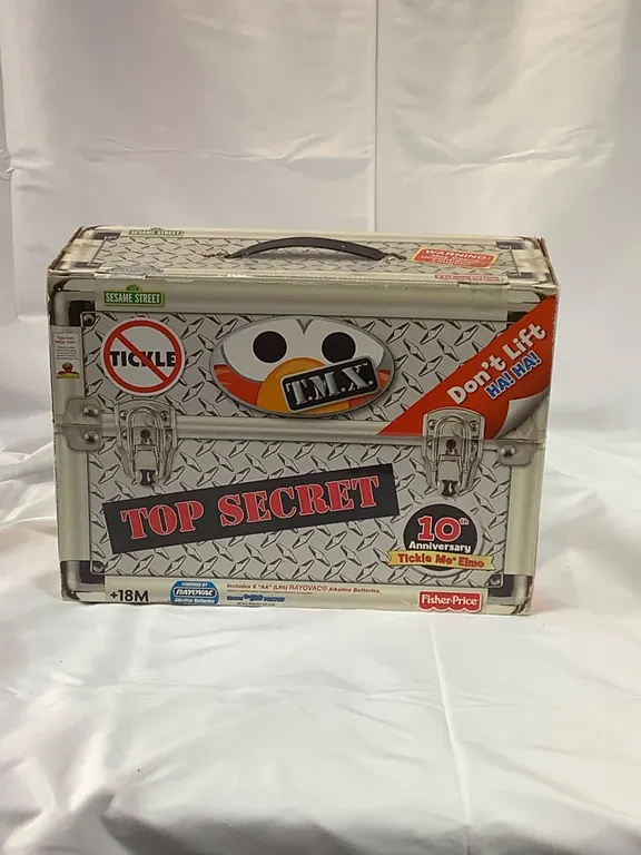 Fischer Price Tickle Me Elmo 10th Anniversary Doll New Seal Unopened talks