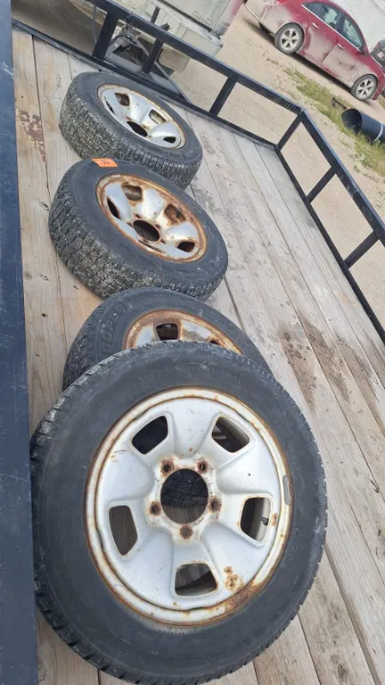 4 - 205/65R16 Studded Winter Tires on Rims 5x5.5 bolt pattern