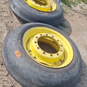 2 Tires with rims. Size 12.4x30 ( Good condition)