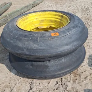 2 Tires with rims ( Good condition) Size 12.4x30