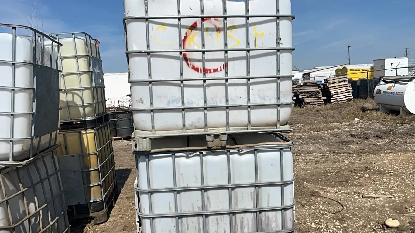 2 - 1000 L POLY TOTE IN METAL CAGE NOT POTABLE