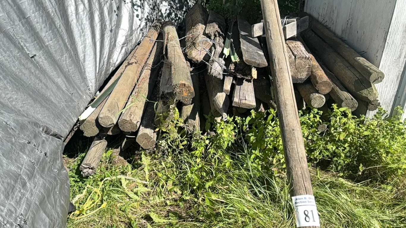 PILE OF FENCE POSTS