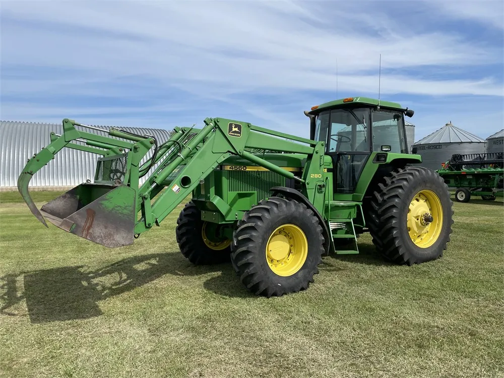 1993 JOHN DEERE 4560 MFWD Tractor w/ JD 280 FEL, Bucket, & Grapple, 7,235 Hours