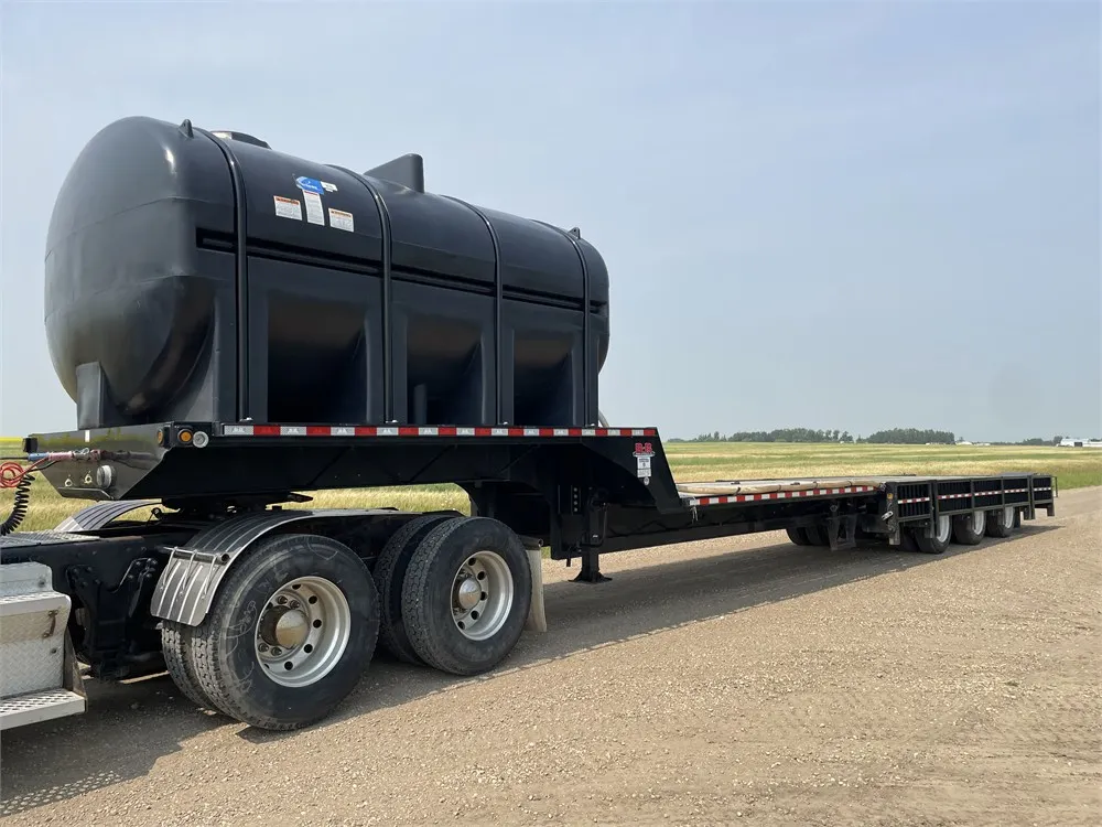 2014 BEHNKE ENTERPRISES INC. Tridem Dually Drop Deck 53 Ft. Sprayer Trailer