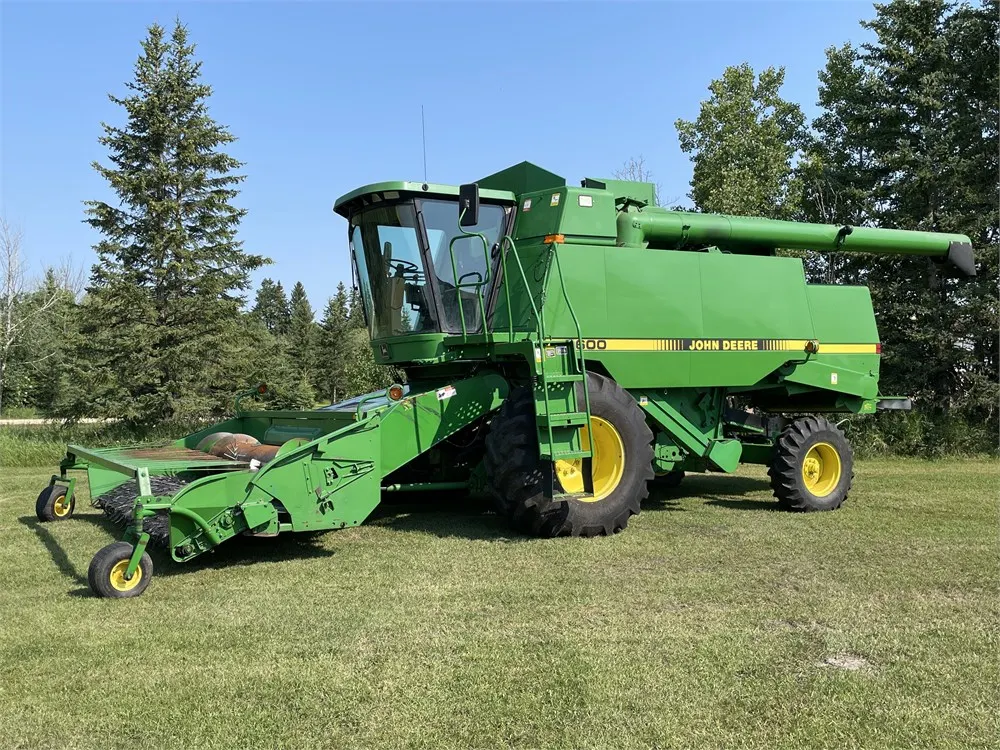 1994 JOHN DEERE 9600 Combine w/ JD 914 (13) Ft. Pickup, Shedded