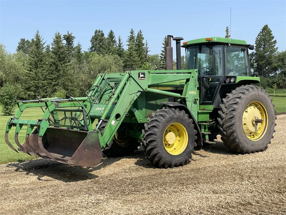 1990 JOHN DEERE 4455 MFWD Tractor w/ JD 280 FEL, 8' Bucket, & Grapple, Shedded