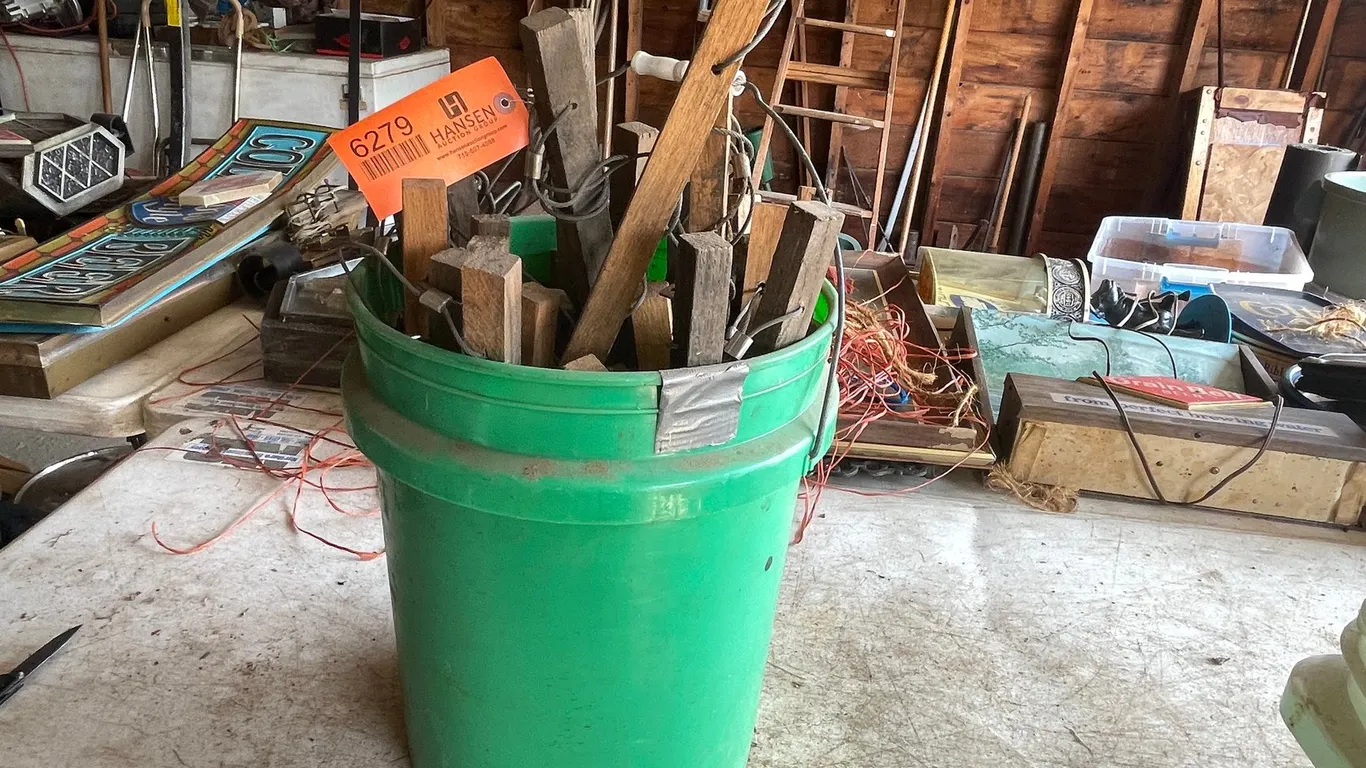 Pail of Trap Line Stakes