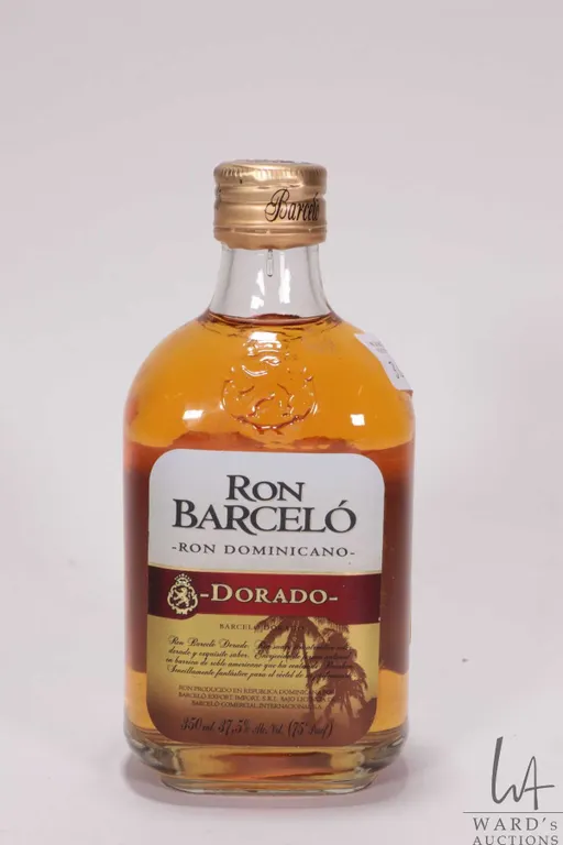 Rona Barcelo/ Dorado/ Rum/ 350ml/ 37.5% ABV Note: Alcohol cannot be insured by any courier in Canada