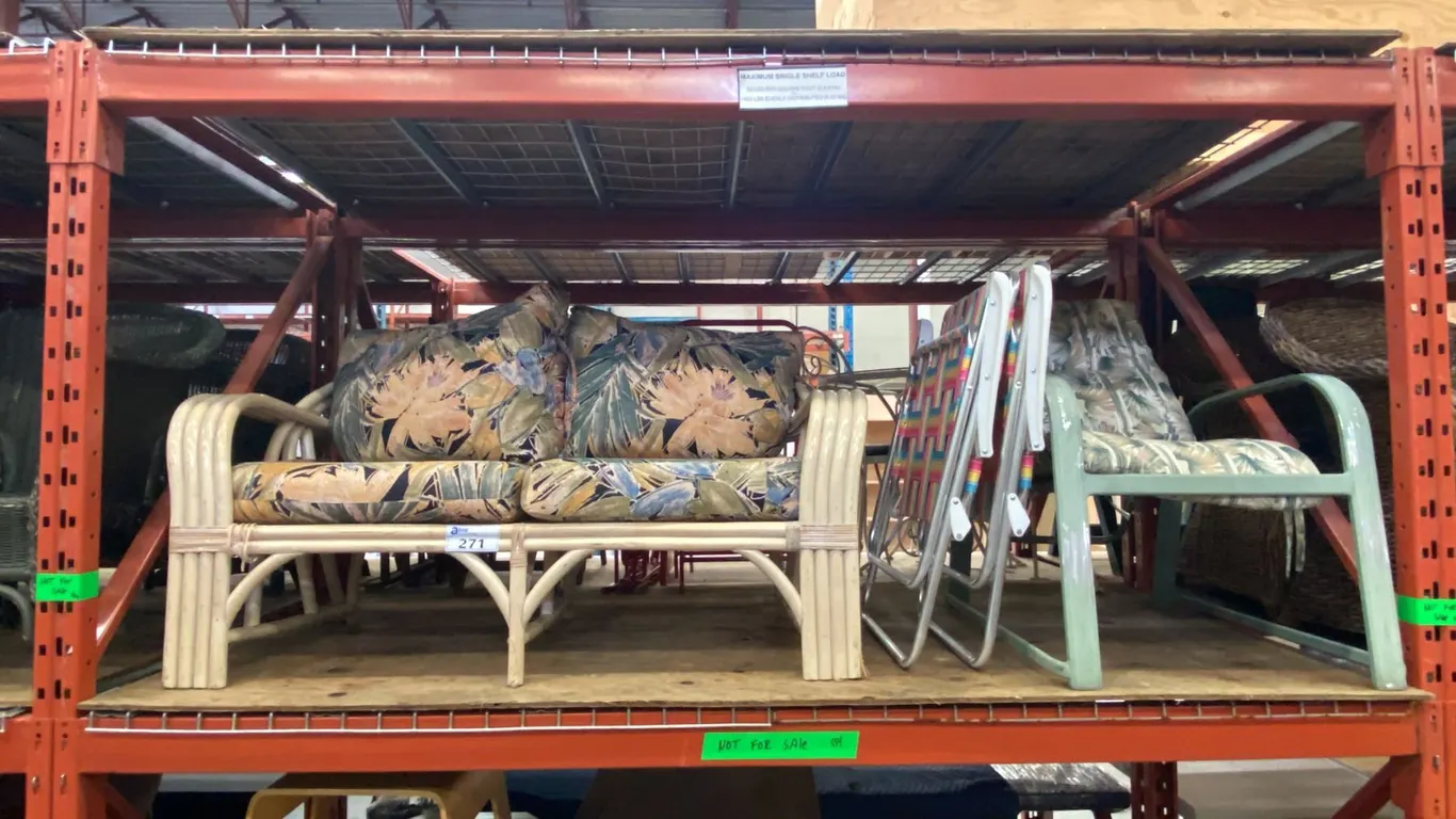 RATTAN LOVESEAT WITH CUSHIONS, 2 FOLDING PATIO CHAIRS AND 1 ADJUSTABLE GREEN METAL PATIO CHAIR