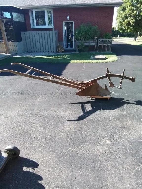 Antique single furrow plow. All original