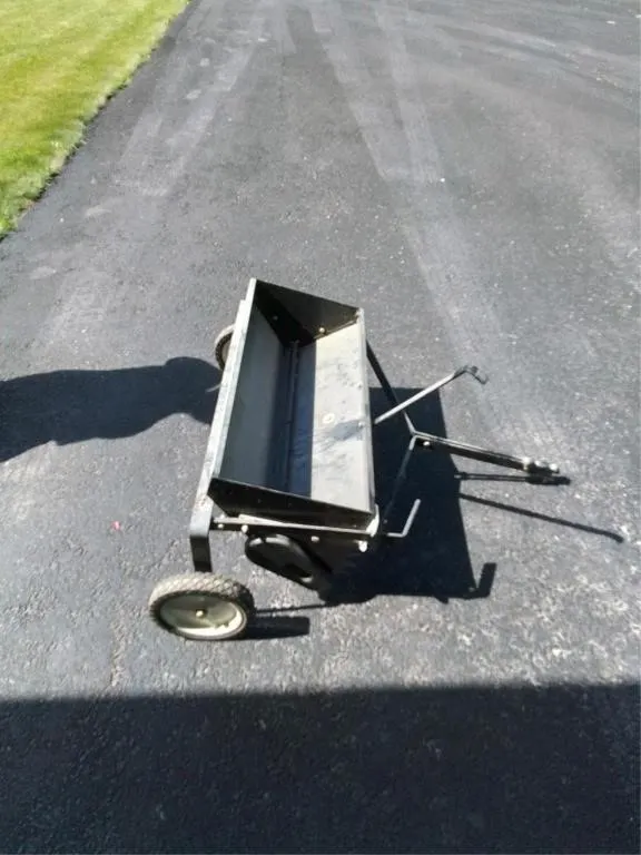 Lawn aireator, fertilizer and seed spreader 30"