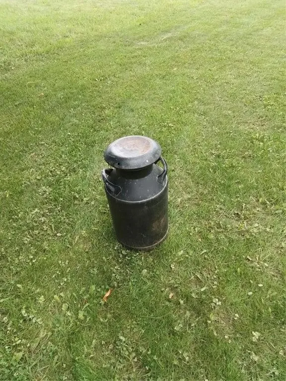 Milk can, small hole in bottom