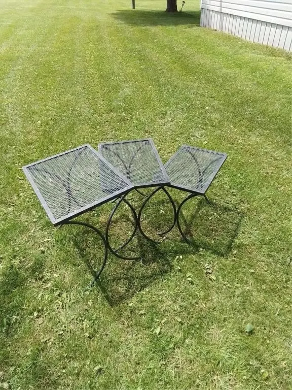 Three outdoor nesting tables . top table is 16"
