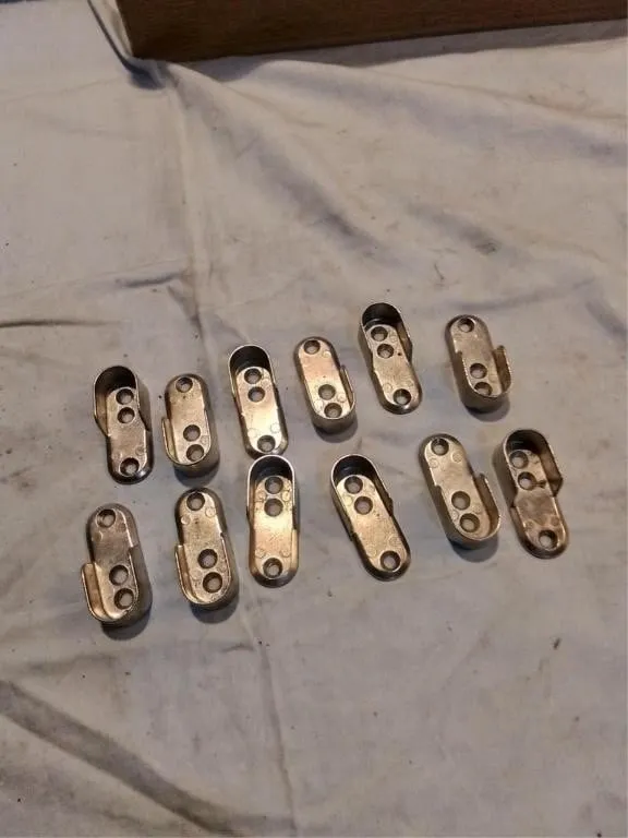 12 brackets. 1/2 " cradle, 1 7/8" long, 3/4" wide
