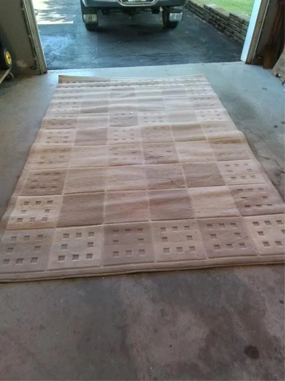 Area rug. 77" x 114"