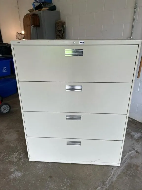 One four drawer lateral file cabinet legsl size