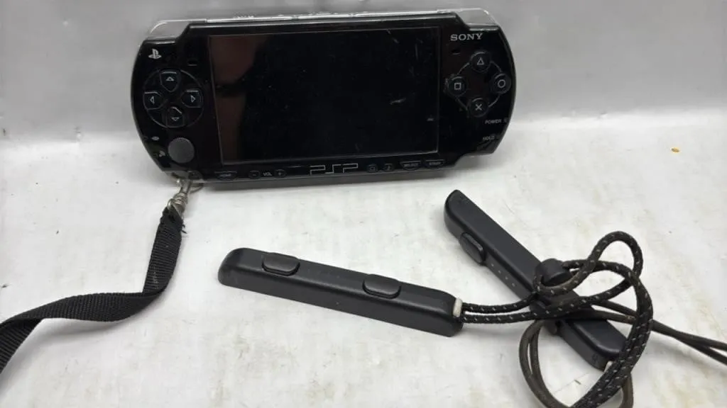 PlayStation PSP handheld console & switch lot