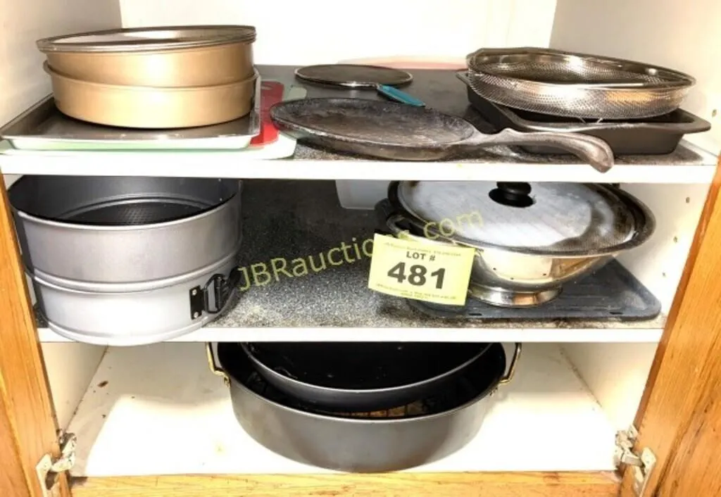 CABINET W CAKE PANS AND ROASTING PAN