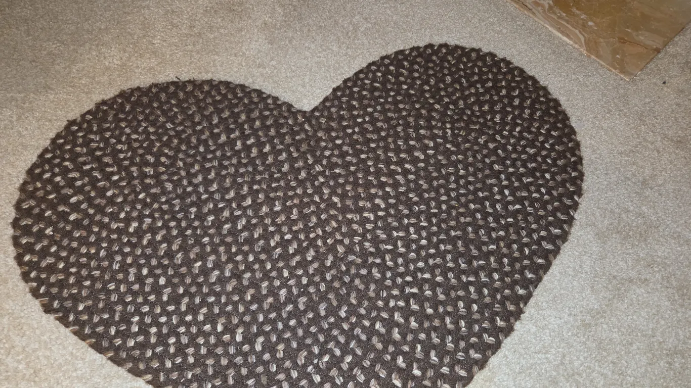 Woven heart rug