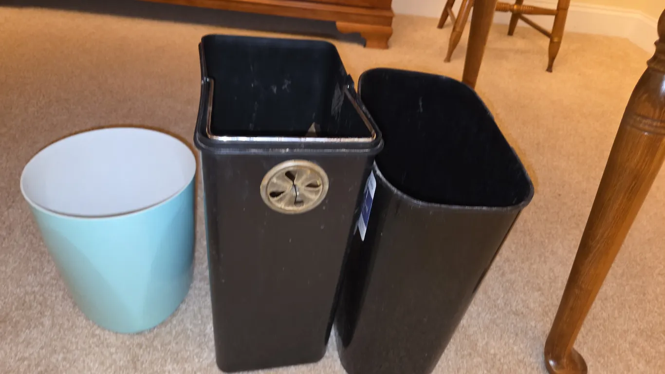 3 small trash cans