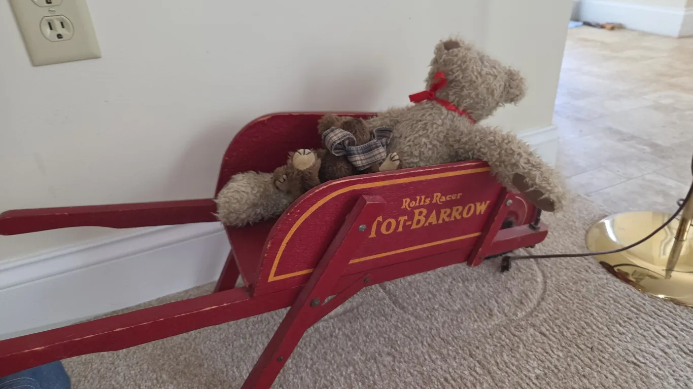 Teddy bear in a tot barrel