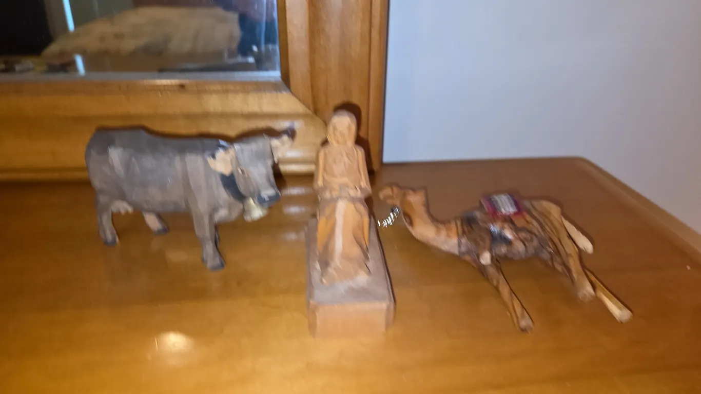 Hand carved cal camel and small statue