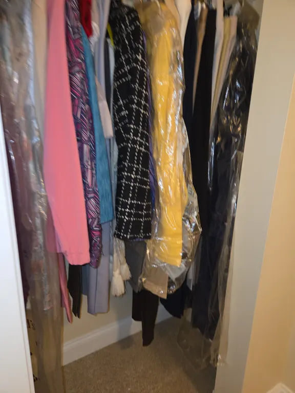 Large closet full of women's clothes