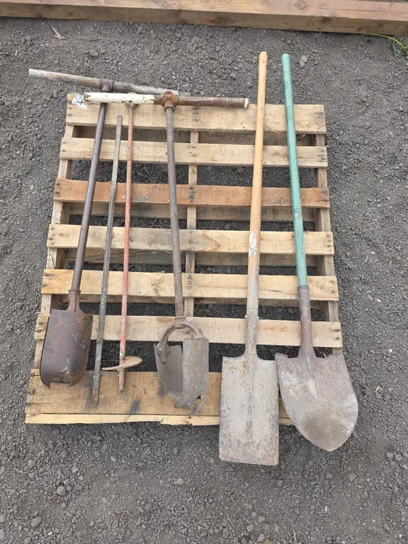 Hand tools shovels post hole augers