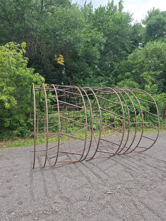 3 steel round bale feeders