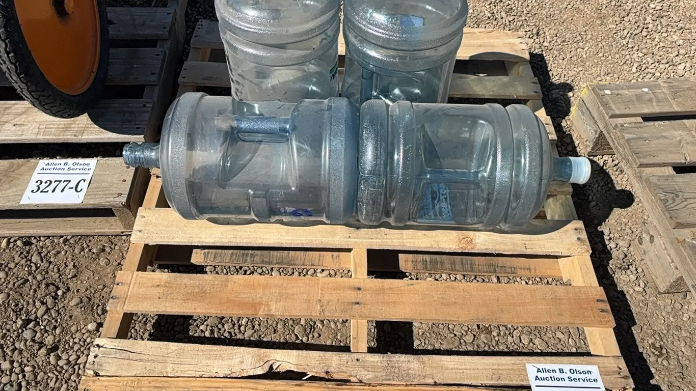 4 - PLASTIC WATER BOTTLES FOR WATER COOLER