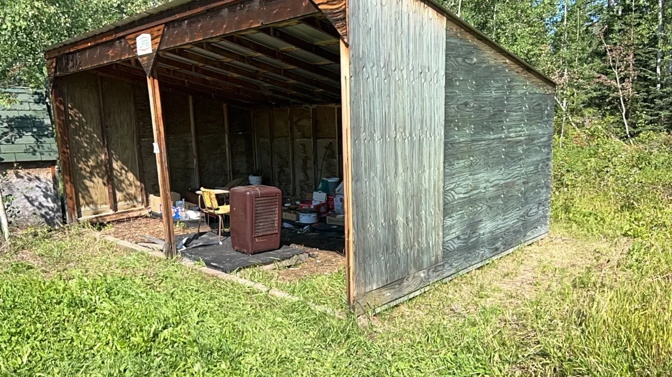 19.5'Lx12'W OPEN FACED SHED ON SKIDS - CONTENTS NOT INCLUDED - SHED WILL BE AVAILABLE LAST DAY OF LOADOUT SO ITEMS CAN BE REMOVED