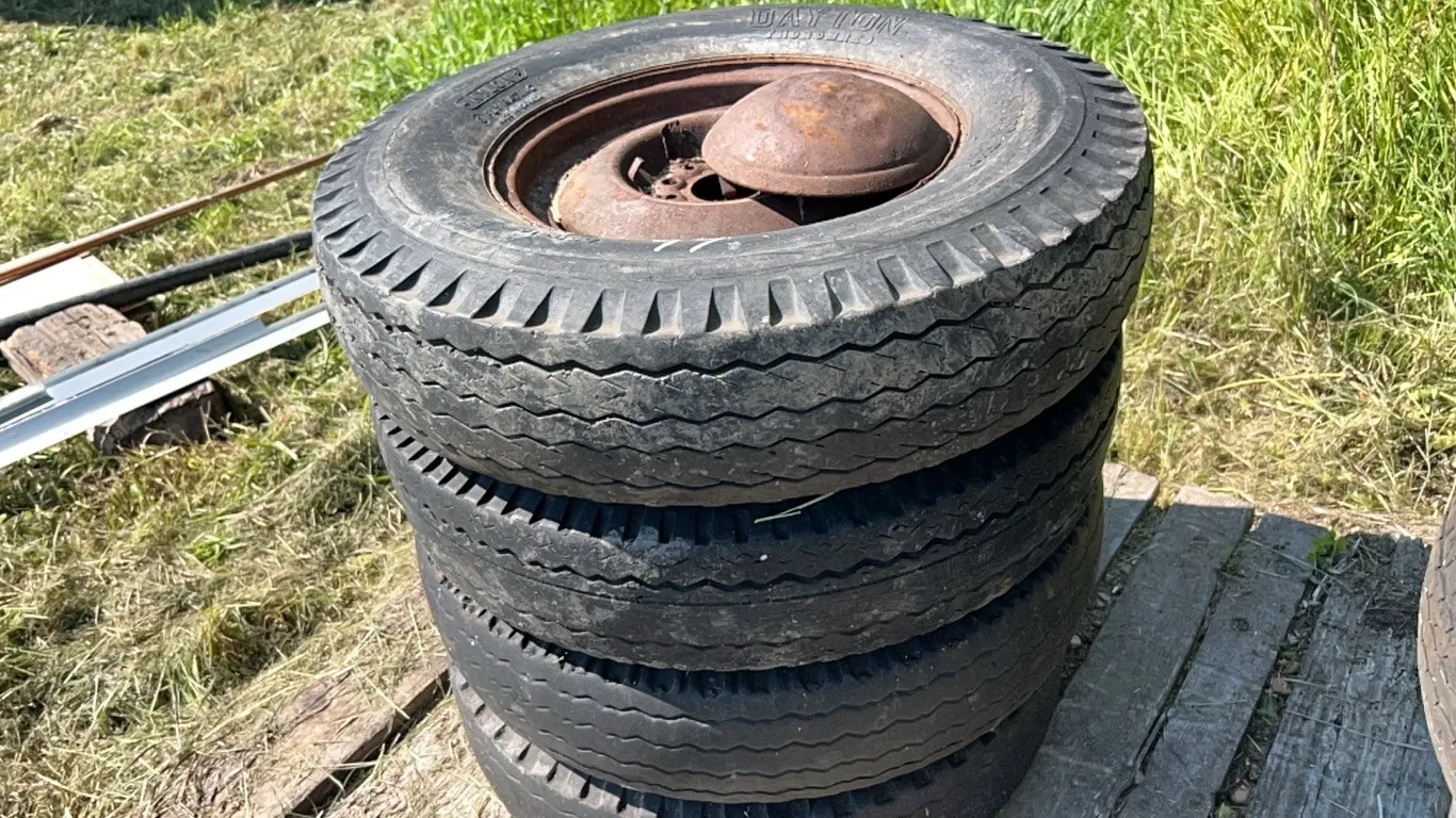 4 - 7.50-16 TIRES ON 6 HOLE RIMS