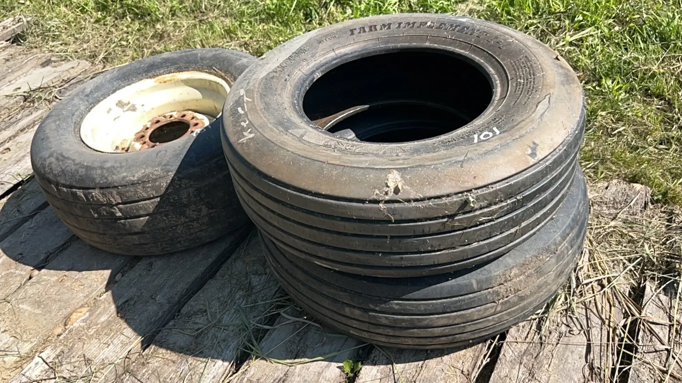 3 - 15" IMPLEMENT TIRES - 1 IS ON 6 HOLE RIM