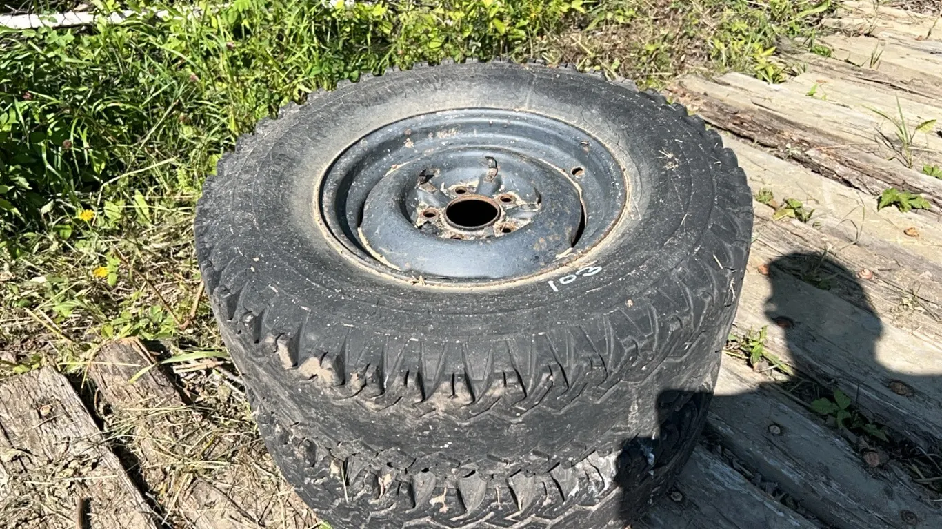 2 - 15" TIRES ON 5 HOLE RIMS - POSSIBLE RIM VALUE ONLY
