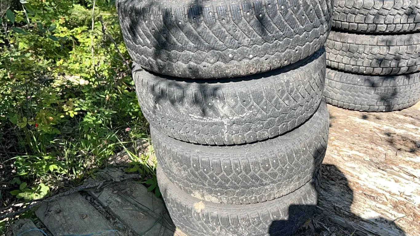 4 - 225/65R17" TIRES ON 5 HOLE DODGE RIMS