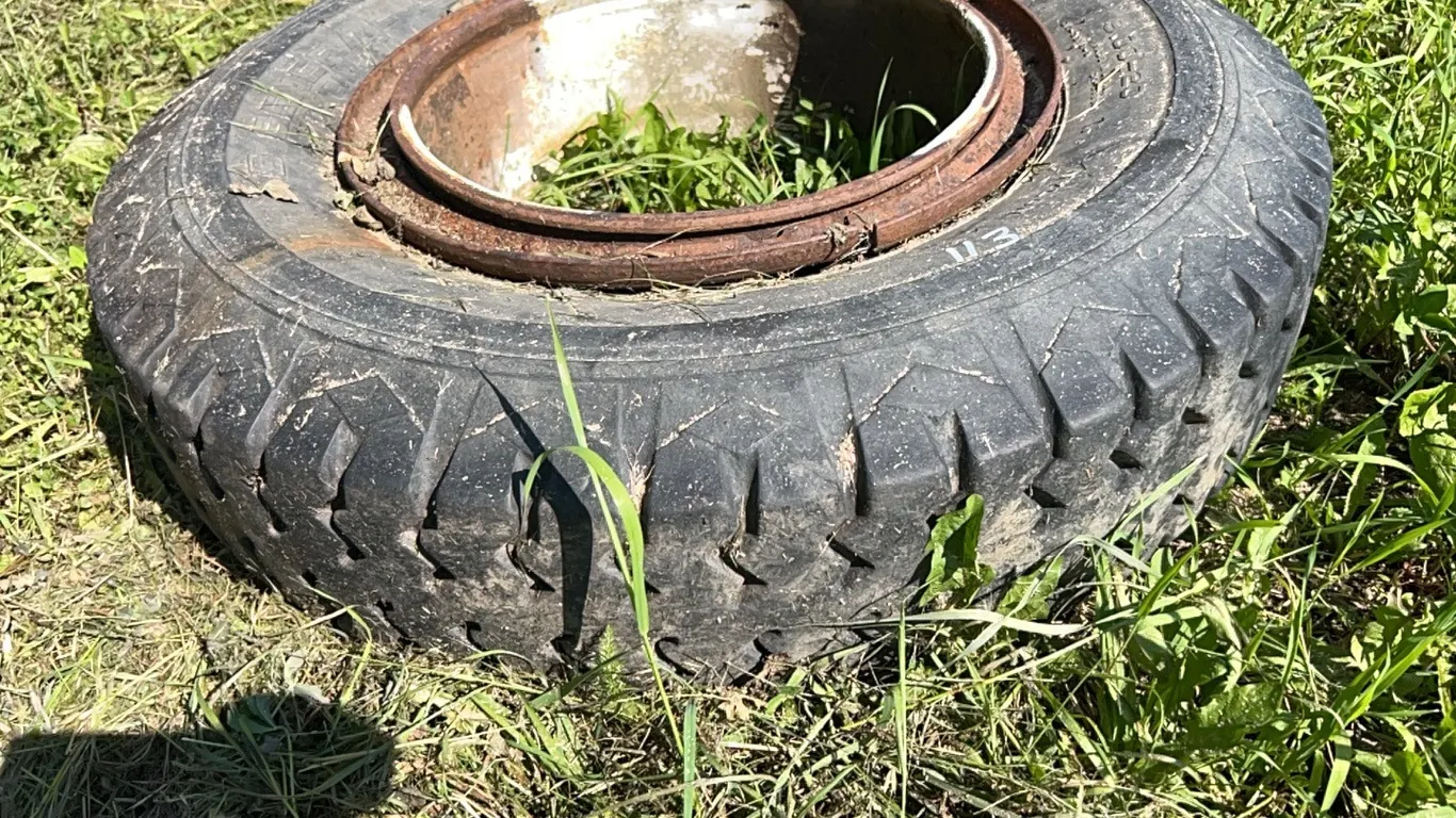 9.00-20" TRUCK TIRE ON DAYTON RIM - CONDITION UNKNOWN